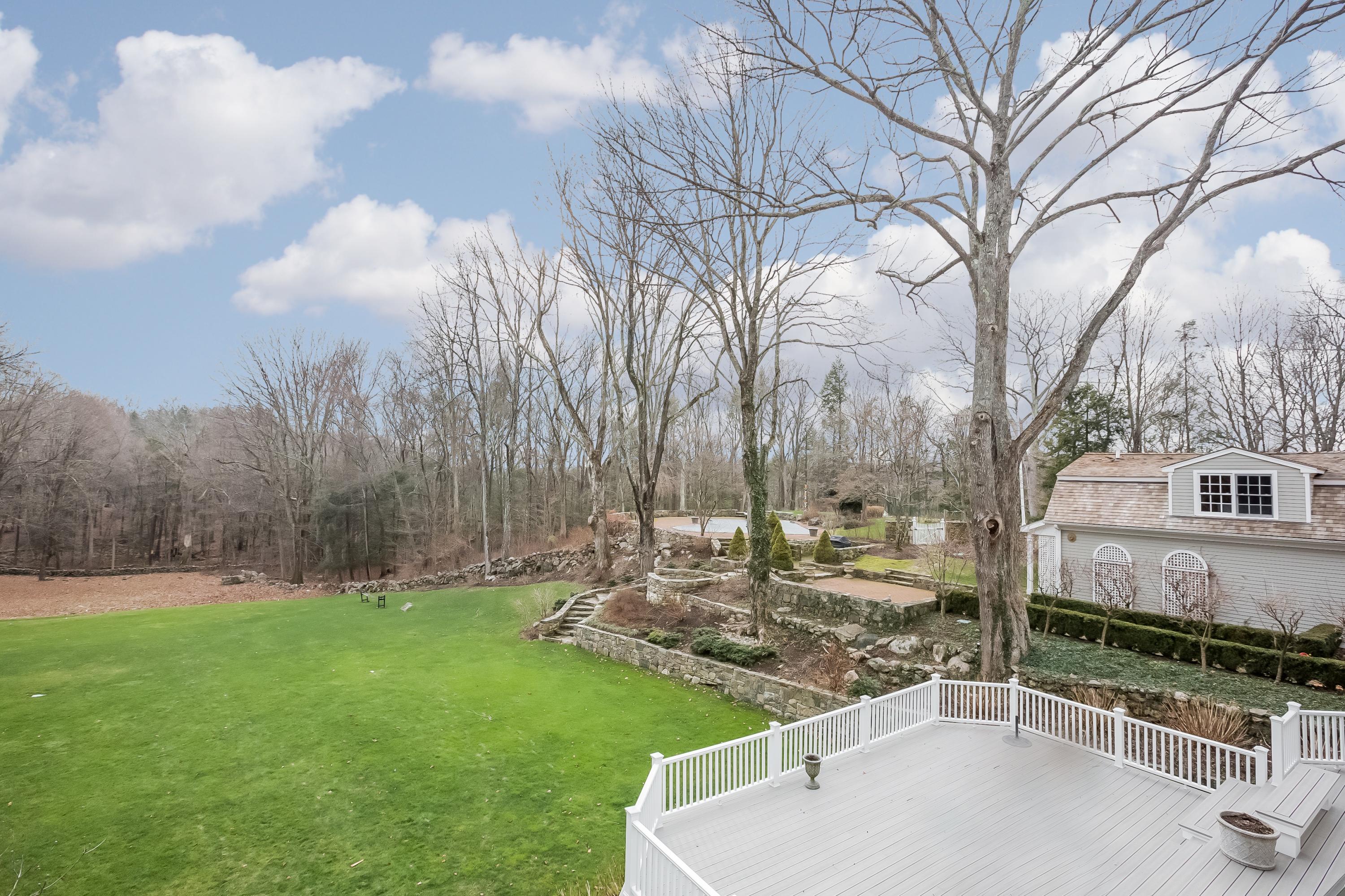 543 Cascade Road New Canaan, CT 06840 - Photo 23 of 23 a view of backyard with green space