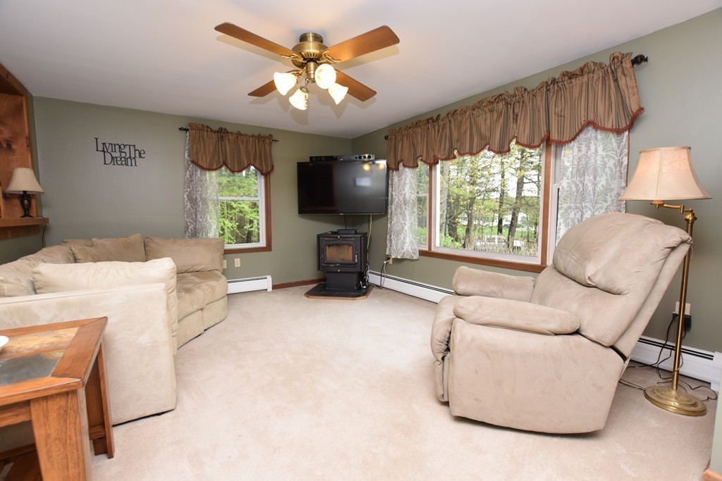 211 Bumstead Road Monson, MA 01057 - Photo 9 of 30 a living room with furniture and a large window