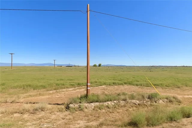 a view of an ocean and mountain