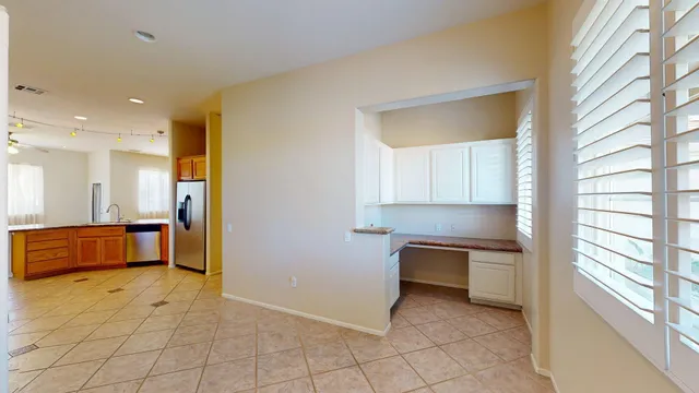 a view of kitchen with windows