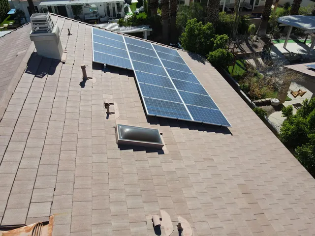 a bedroom with a bed and a potted plant