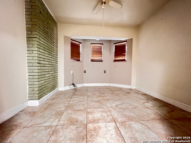 625 Oakhaven Road Pleasanton, TX 78064 - Photo 13 of 20 a view of an empty room with a window