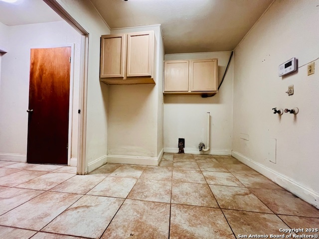 625 Oakhaven Road Pleasanton, TX 78064 - Photo 14 of 20 a view of a kitchen with wooden floor and a sink