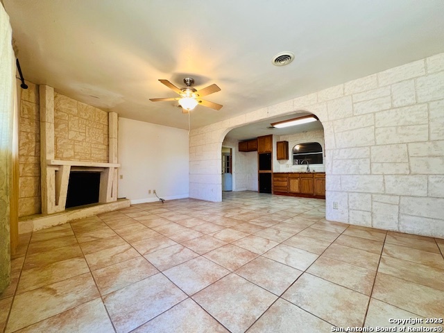 625 Oakhaven Road Pleasanton, TX 78064 - Photo 4 of 20 a view of an empty room with a fireplace