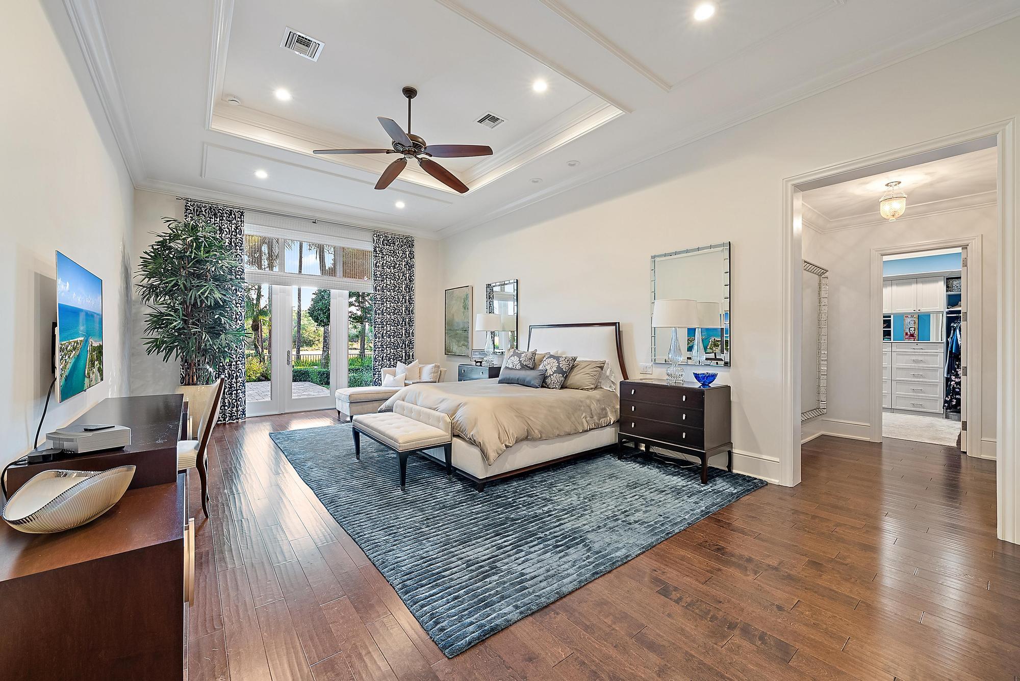 7770 Old Marsh Road Palm Beach Gardens, FL 33418 - Photo 19 of 45 a bedroom with a bed window and couch