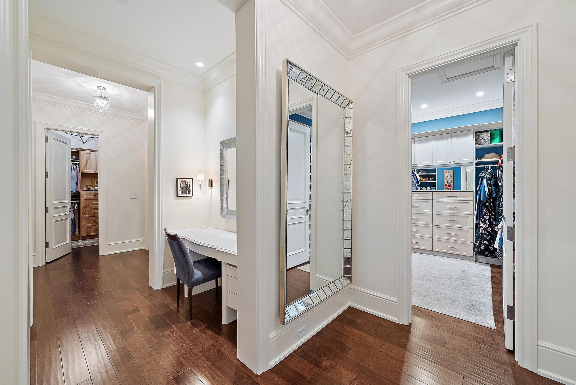 7770 Old Marsh Road Palm Beach Gardens, FL 33418 - Photo 20 of 45 wooden floor with a table and a mirror in a room