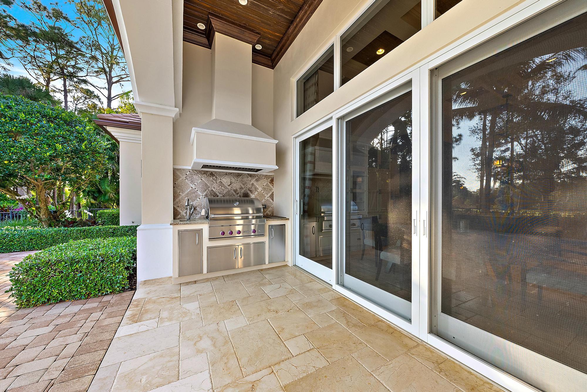 7770 Old Marsh Road Palm Beach Gardens, FL 33418 - Photo 37 of 45 a large white building with shower