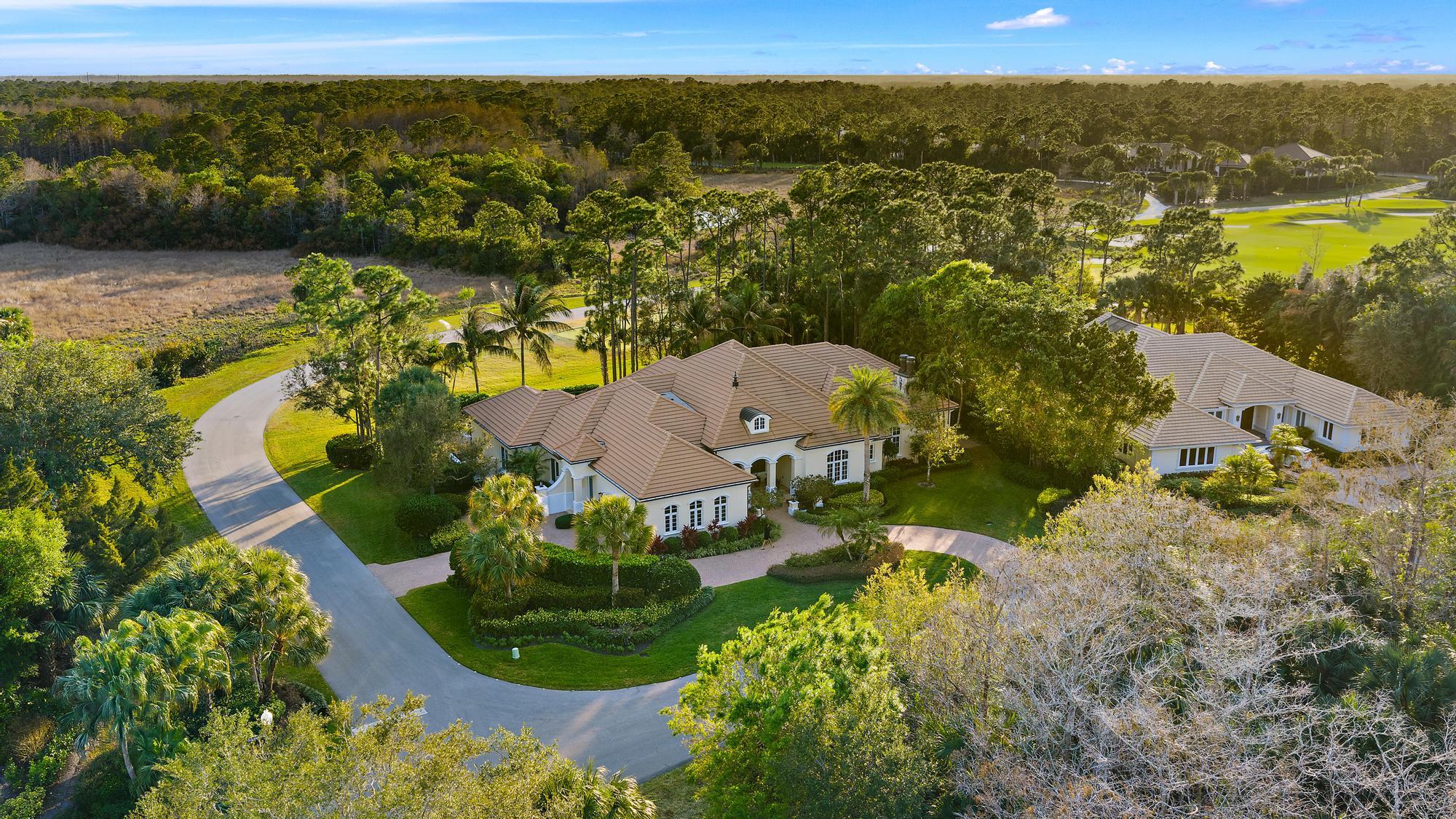 7770 Old Marsh Road Palm Beach Gardens, FL 33418 - Photo 42 of 45 an aerial view of residential houses with outdoor space