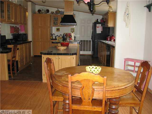 1183 Kallam Farm Road Sandy Ridge, NC 27046 - Photo 11 of 16 Dining Room. Dining Room Looking into Kitchen
