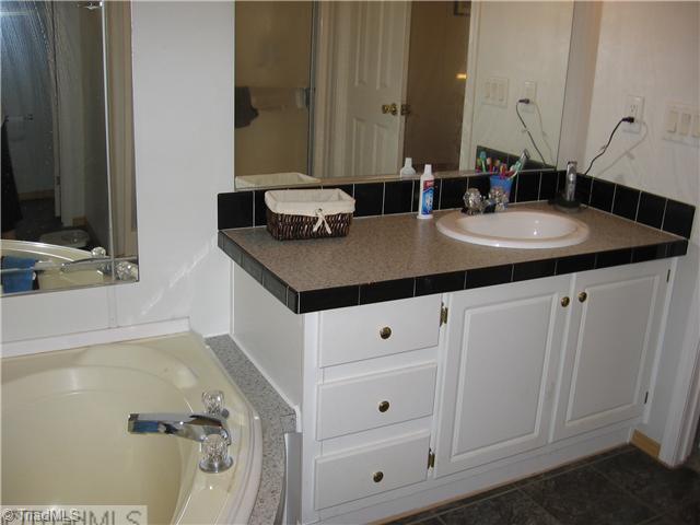 1183 Kallam Farm Road Sandy Ridge, NC 27046 - Photo 14 of 16 Master Bath/Spa. Master Bath Offers His & Her Vanities