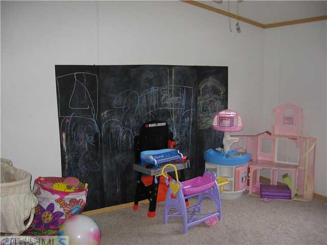 1183 Kallam Farm Road Sandy Ridge, NC 27046 - Photo 15 of 16 2nd Bedroom. Bedroom or Playroom with Painted Chalkboard Area