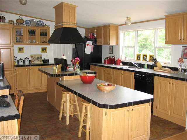 1183 Kallam Farm Road Sandy Ridge, NC 27046 - Photo 4 of 16 Kitchen. Large Open Kitchen with Loads of Cabinet Space