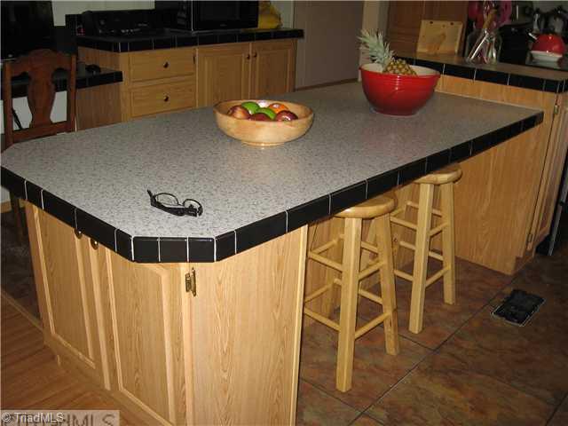 1183 Kallam Farm Road Sandy Ridge, NC 27046 - Photo 10 of 16 Kitchen. Extra Eating Area @ the Bar