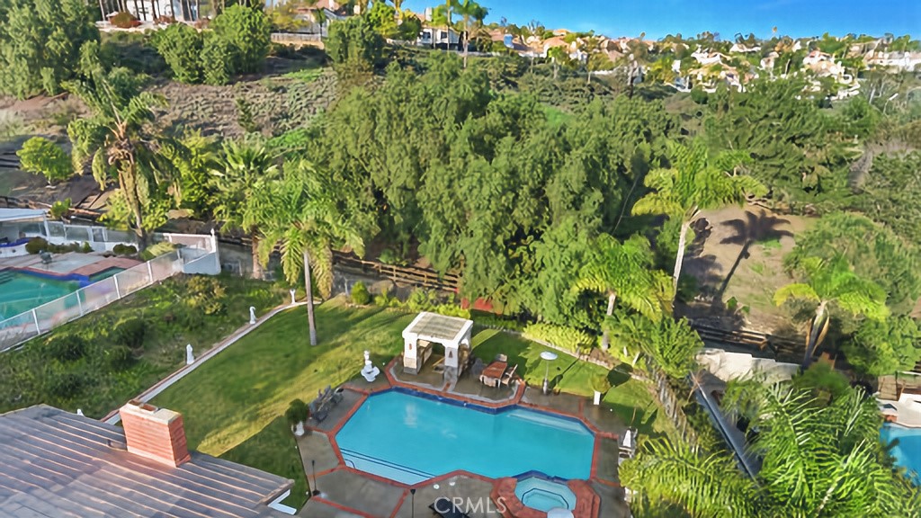 25641 Rapid Falls Road Laguna Hills, CA 92653 - Photo 1 of 50 a view of yard from deck having patio