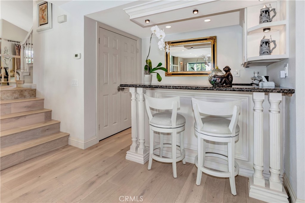 25641 Rapid Falls Road Laguna Hills, CA 92653 - Photo 20 of 50 a view of dining room and wooden floor