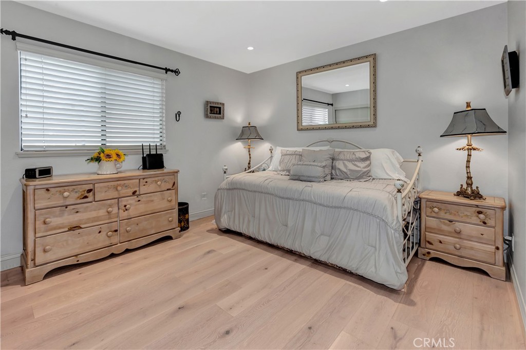 25641 Rapid Falls Road Laguna Hills, CA 92653 - Photo 32 of 50 a bed room with a bed and a window