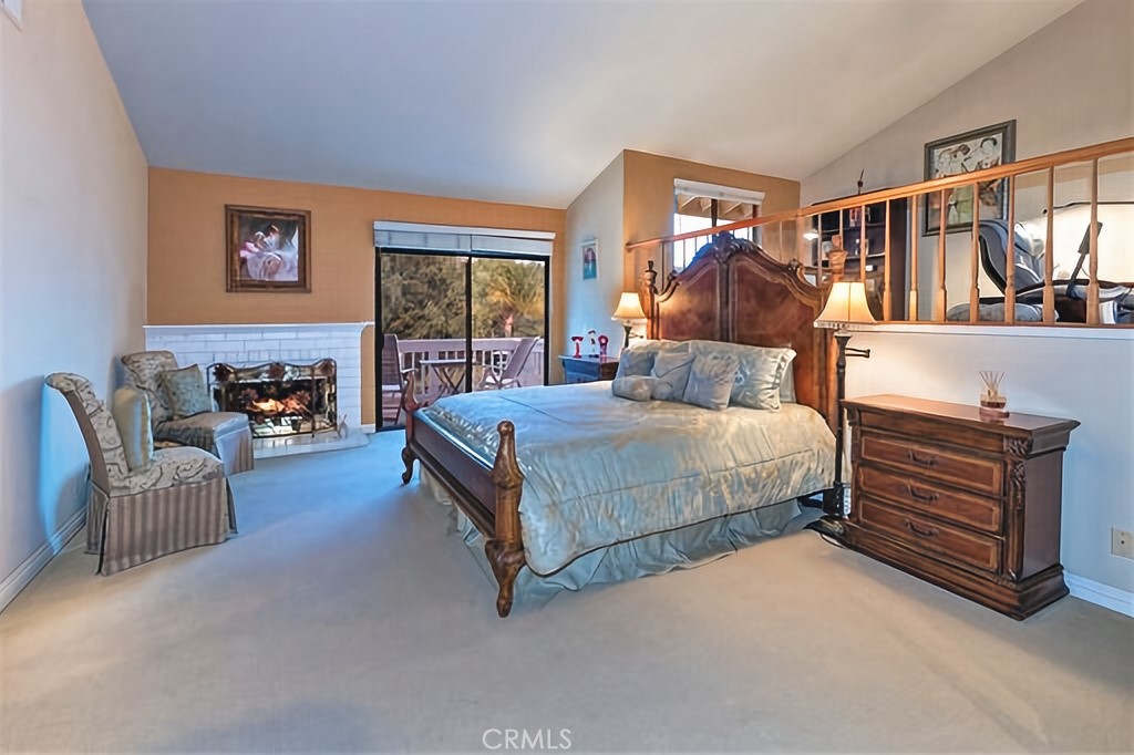 25641 Rapid Falls Road Laguna Hills, CA 92653 - Photo 36 of 50 a bedroom with a bed and dresser with chair