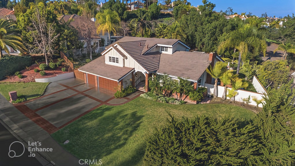 25641 Rapid Falls Road Laguna Hills, CA 92653 - Photo 4 of 50 an aerial view of a house with a yard