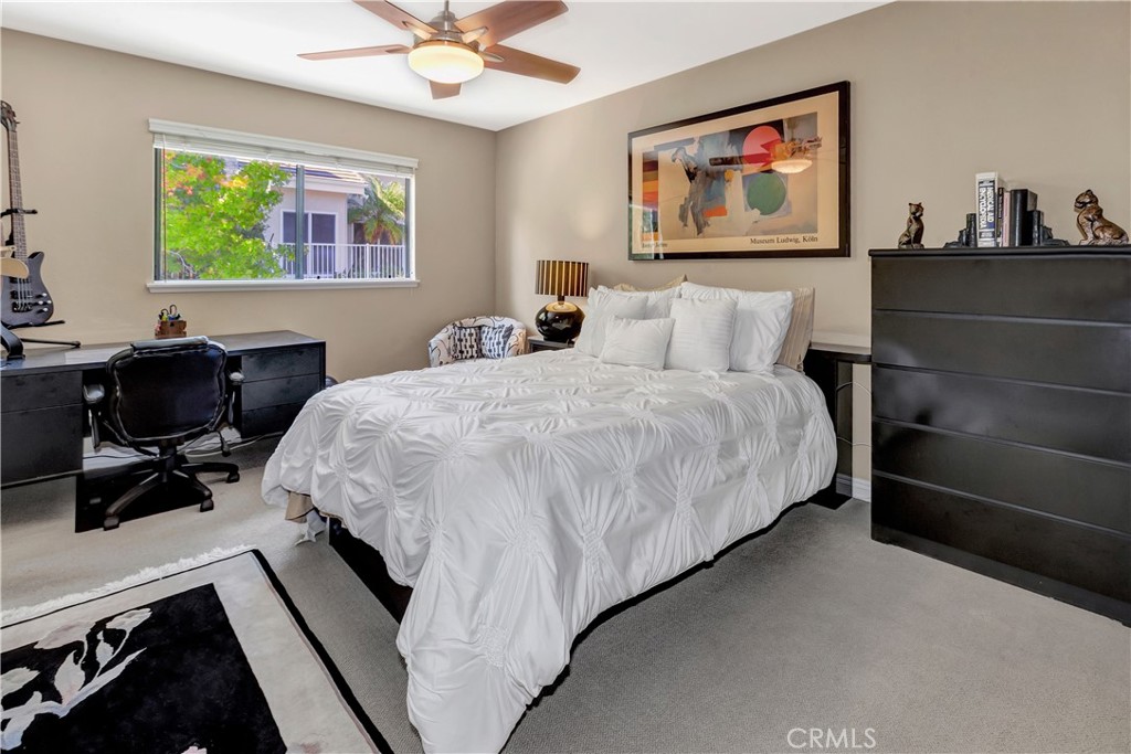 25641 Rapid Falls Road Laguna Hills, CA 92653 - Photo 43 of 50 a bedroom with a bed and a desk