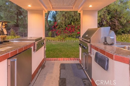 25641 Rapid Falls Road Laguna Hills, CA 92653 - Photo 46 of 50 a utility room with washer and dryer