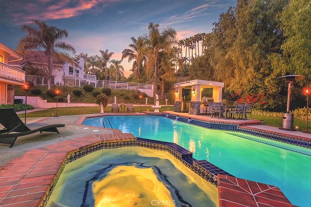 25641 Rapid Falls Road Laguna Hills, CA 92653 - Photo 47 of 50 a view of swimming pool with outdoor seating and city view