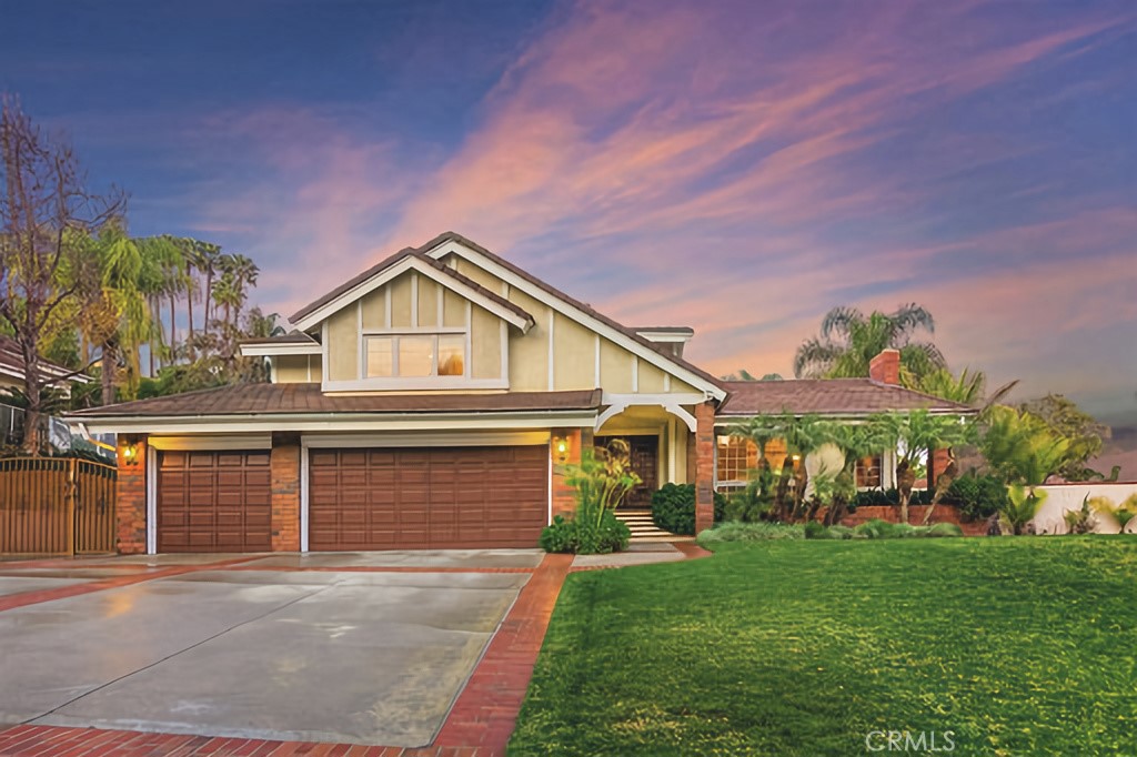 25641 Rapid Falls Road Laguna Hills, CA 92653 - Photo 6 of 50 a front view of a house with garden