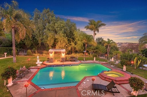 25641 Rapid Falls Road Laguna Hills, CA 92653 - Photo 8 of 50 an outdoor space with furniture and garden