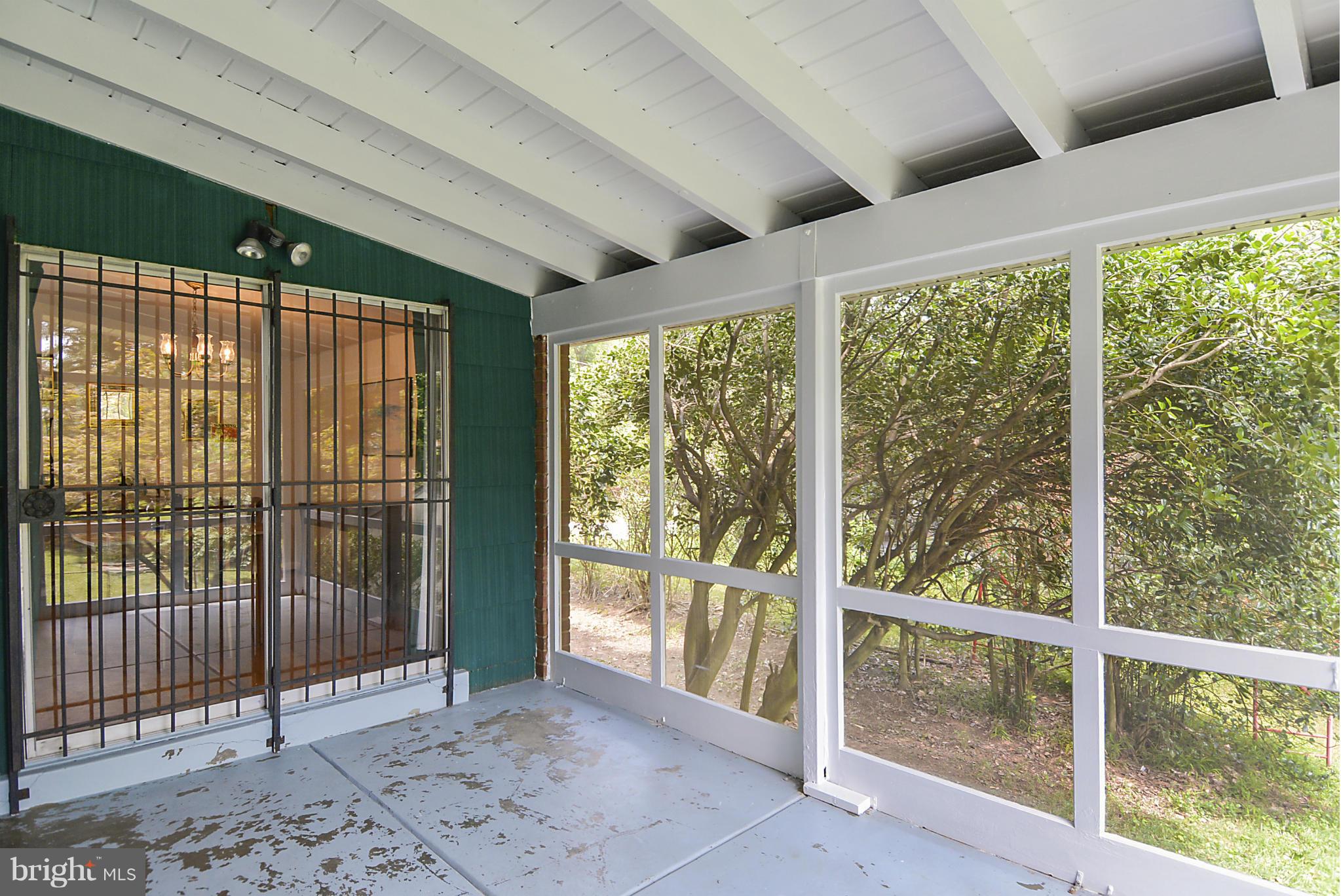 910 North Belgrade Road Silver Spring, MD 20902 - Photo 9 of 30 Screened Porch off Dining Room