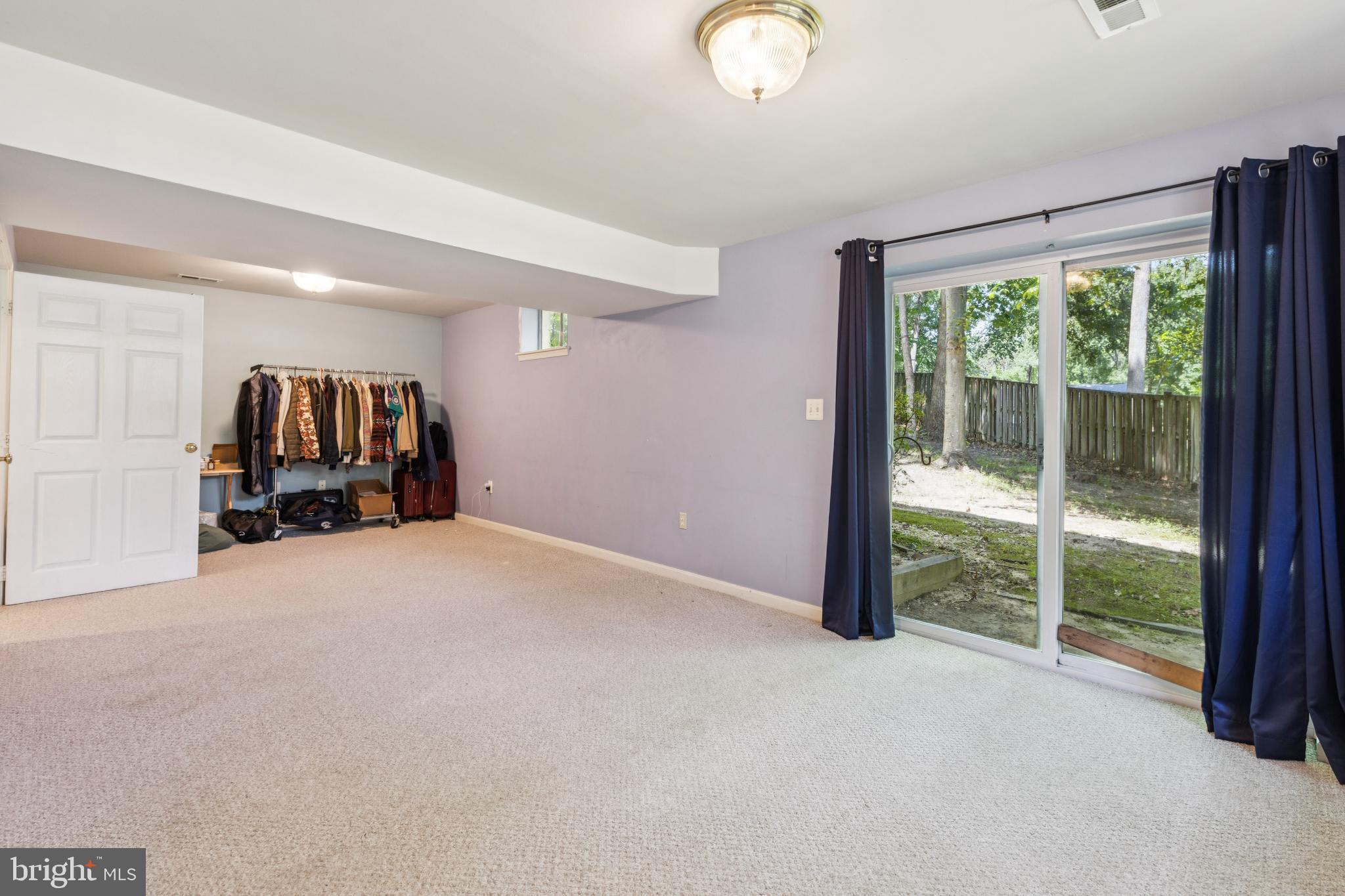 3404 Holly Circle Triangle, VA 22172 - Photo 14 of 68 Recreation room with walk-out access to large yard