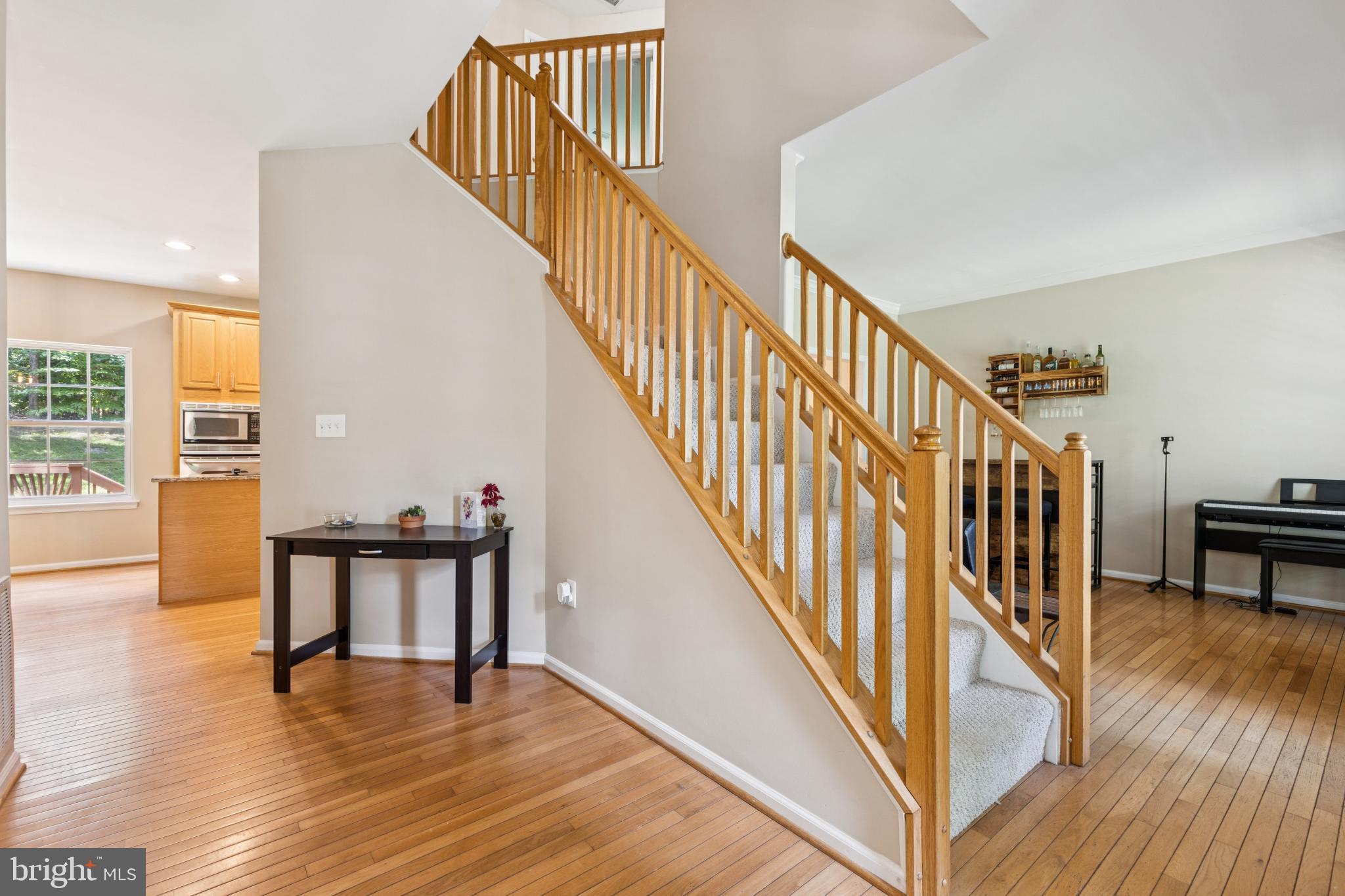 3404 Holly Circle Triangle, VA 22172 - Photo 61 of 68 Inviting entryway with elegant staircase.