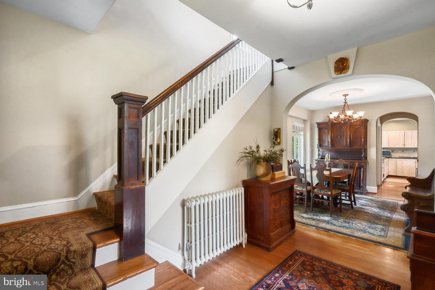 16 Maple Avenue Washington Grove, MD 20880 - Photo 13 of 58 Elegant entryway with classic staircase charm.