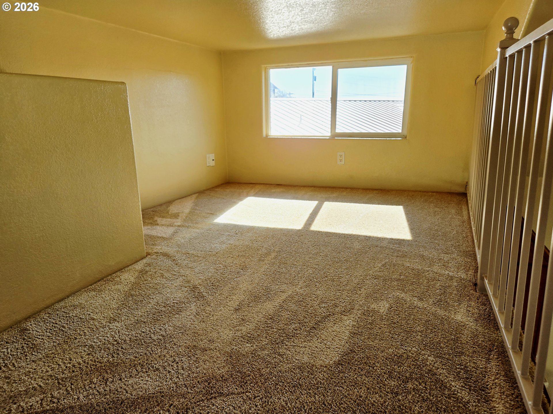 16219 Lower Harbor Road, Unit 18 Brookings, OR 97415 - Photo 29 of 38 a view of a room with a window and a room
