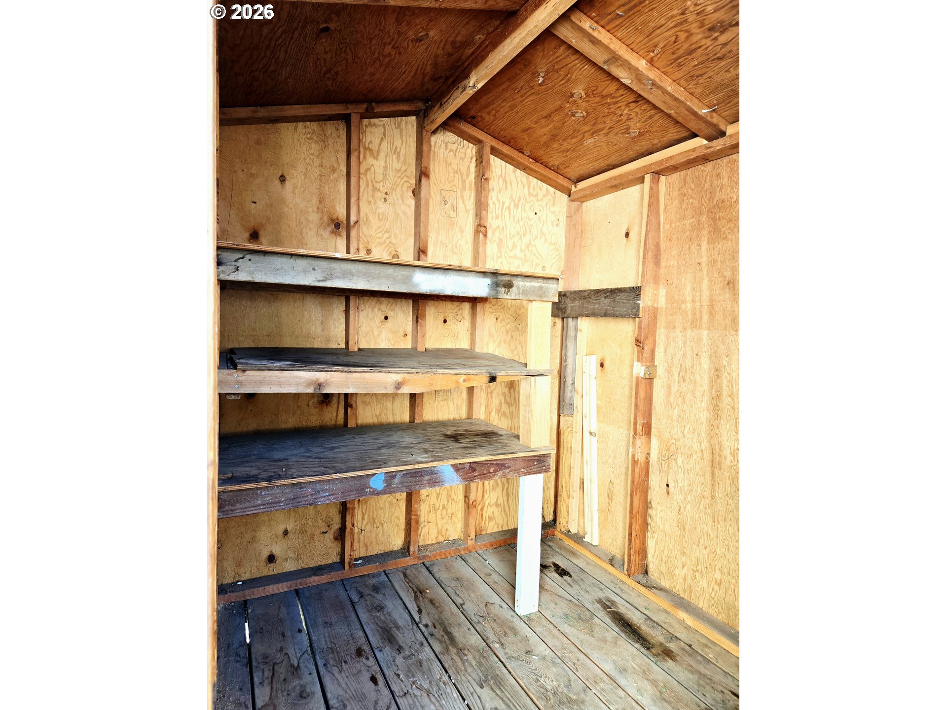 16219 Lower Harbor Road, Unit 18 Brookings, OR 97415 - Photo 34 of 38 a view of a room with a table and chairs