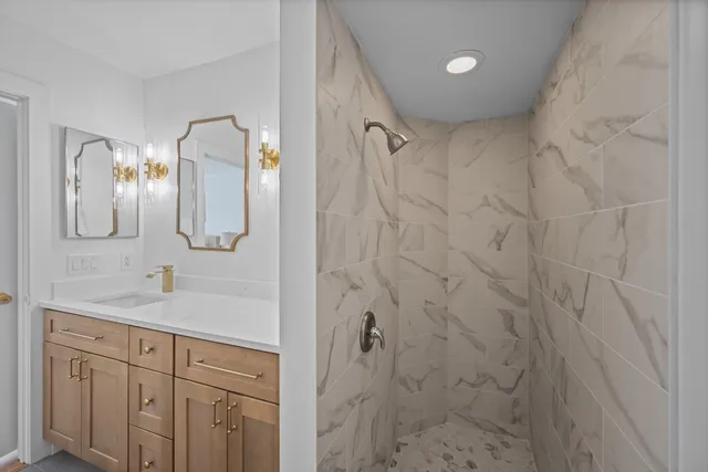 a bedroom with a bed and a television