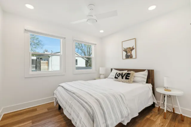 a swimming pool with outdoor seating and yard