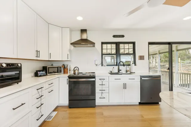 a bedroom with a bed and a couch