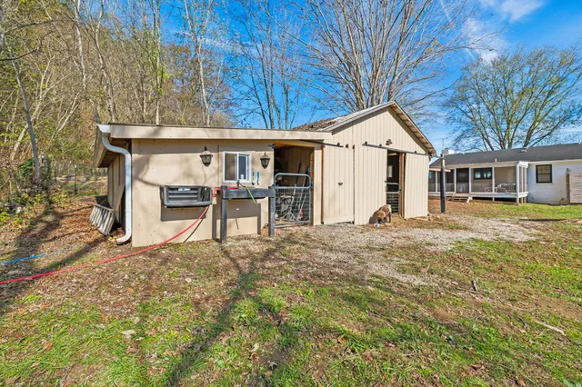 a backyard of a house with lots of green space