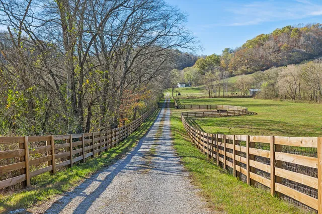 a view of a backyard with sitting area
