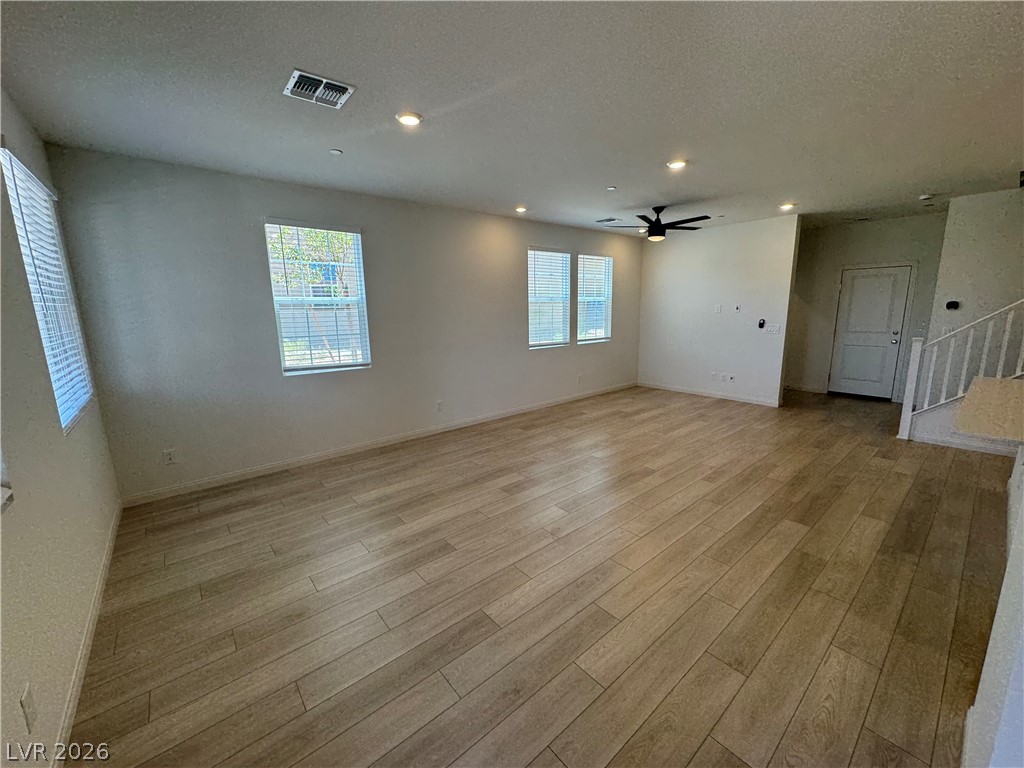 2821 Alcobaca Street Henderson, NV 89044 - Photo 2 of 24 Step into this spacious living area, complete with durable flooring and excellent illumination.