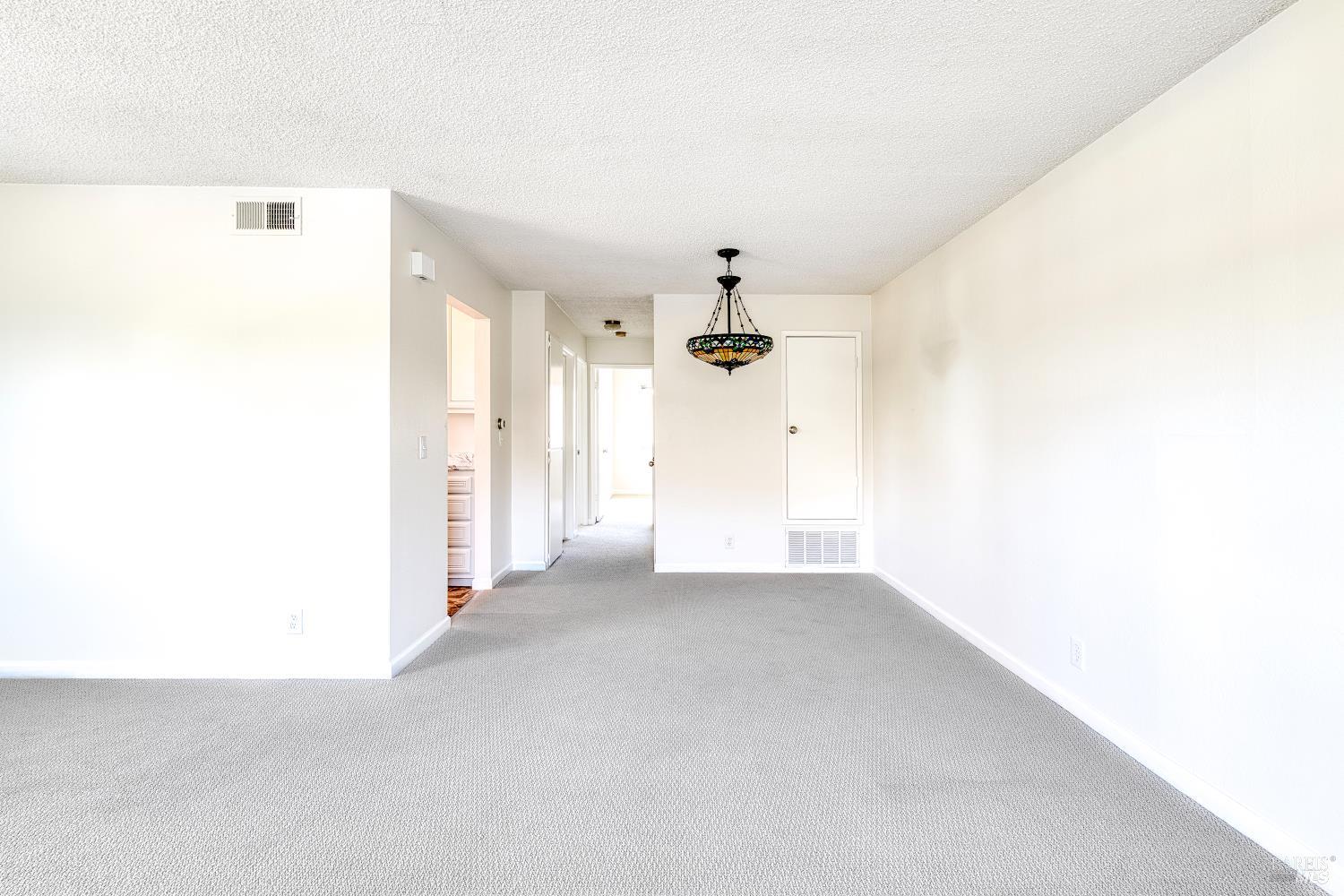 247 Bahia Place San Rafael, CA 94901 - Photo 9 of 22 a view of a big room with closet and windows