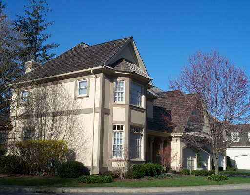 120 Stillson Road, Unit 120 Fairfield, CT 06825 - Photo 1 of 1 a front view of a house with a yard