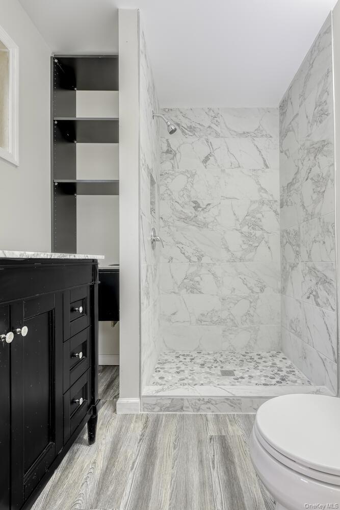 121 Thiells Road Stony Point, NY 10980 - Photo 20 of 34 a bathroom with a granite countertop sink toilet and shower