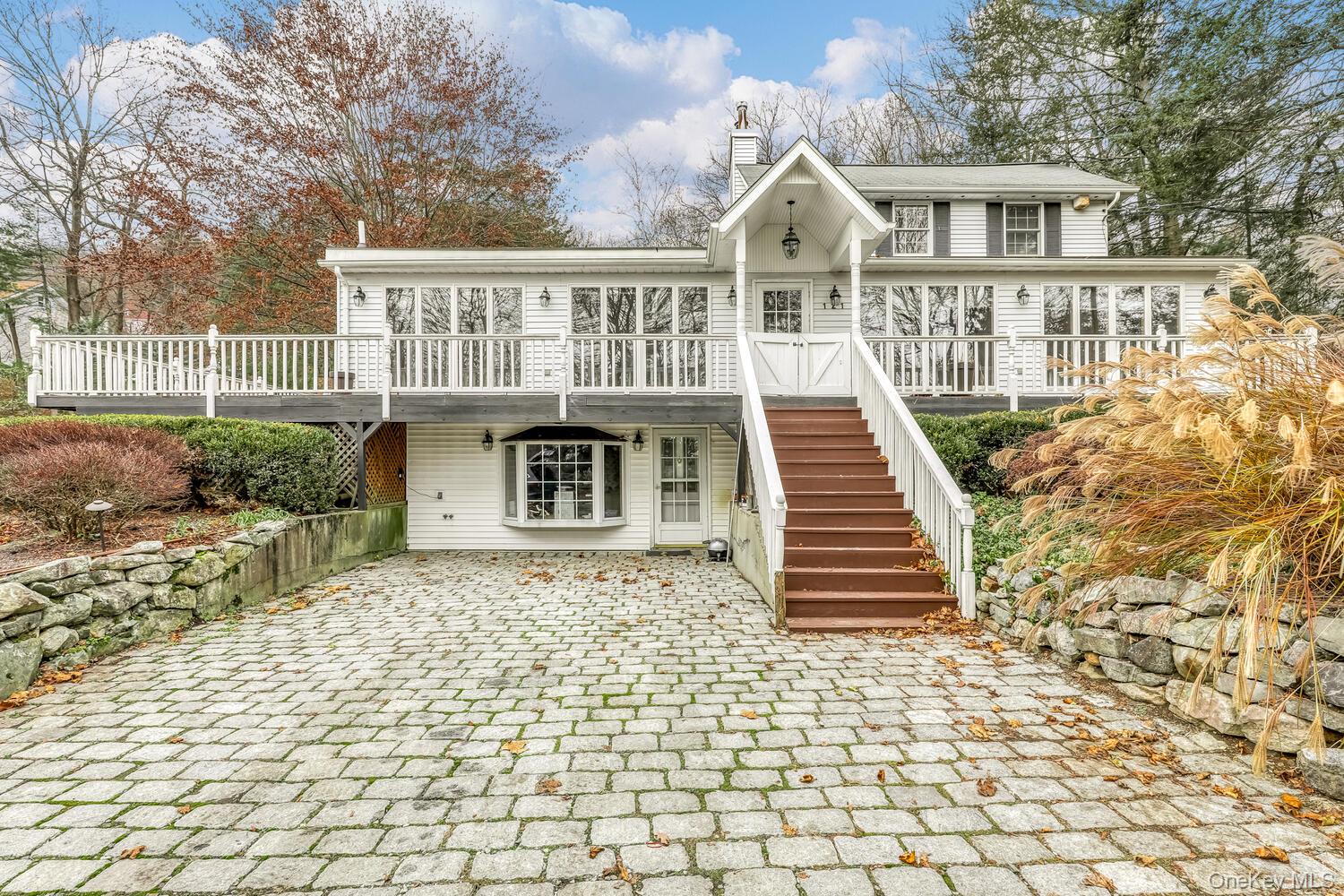 121 Thiells Road Stony Point, NY 10980 - Photo 2 of 34 a front view of a house with a yard
