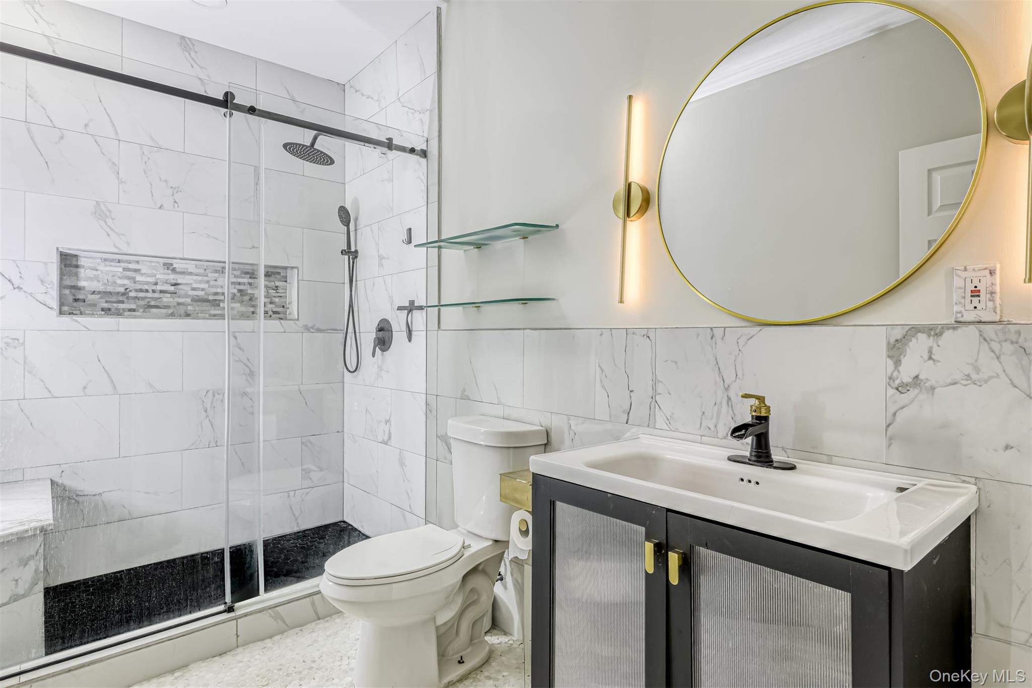 121 Thiells Road Stony Point, NY 10980 - Photo 31 of 34 a bathroom with a sink toilet and a mirror
