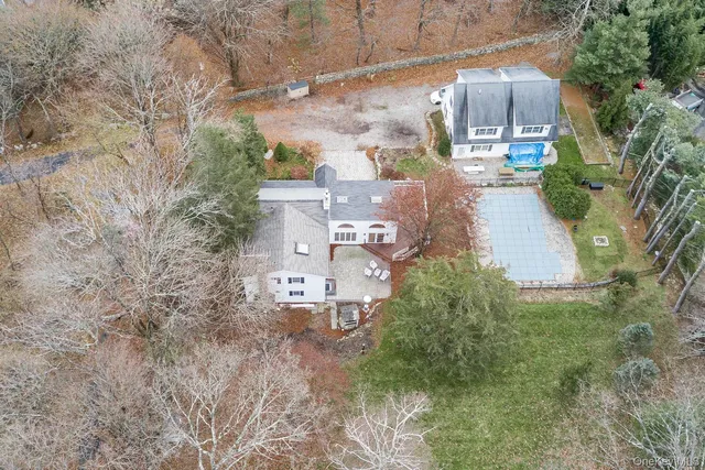 an aerial view of residential house with outdoor space