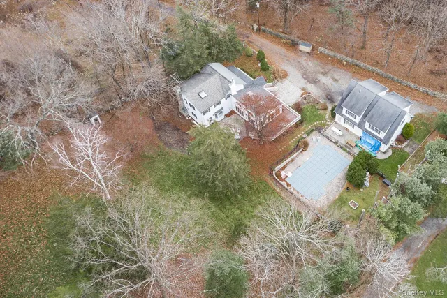 an aerial view of residential house with outdoor space