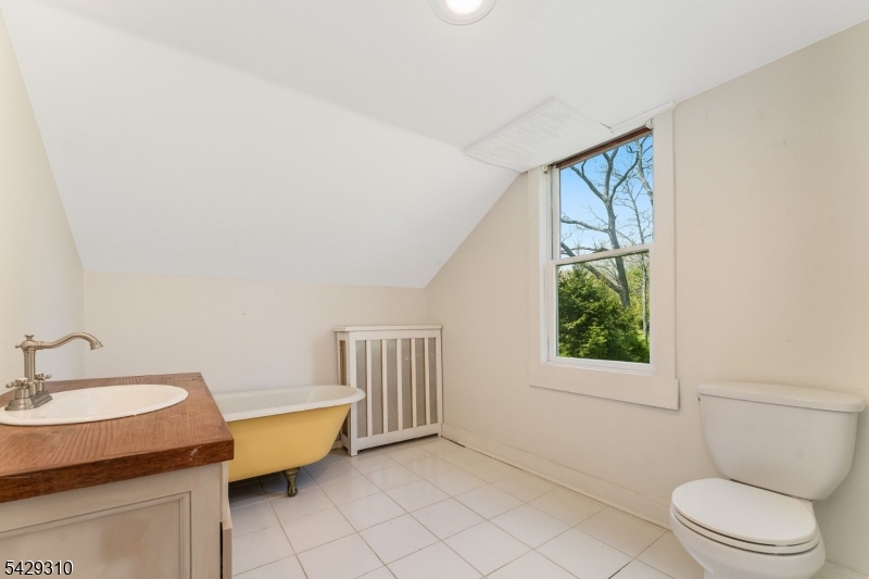 234 Cokesbury Califon Road Lebanon, NJ 08833 - Photo 32 of 46 a bathroom with a sink toilet and mirror