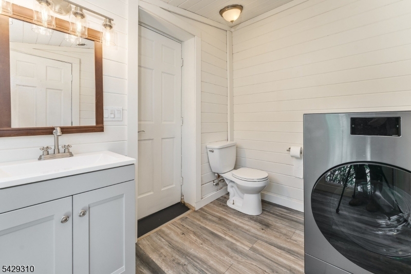 234 Cokesbury Califon Road Lebanon, NJ 08833 - Photo 35 of 46 a bathroom with a toilet a sink and mirror