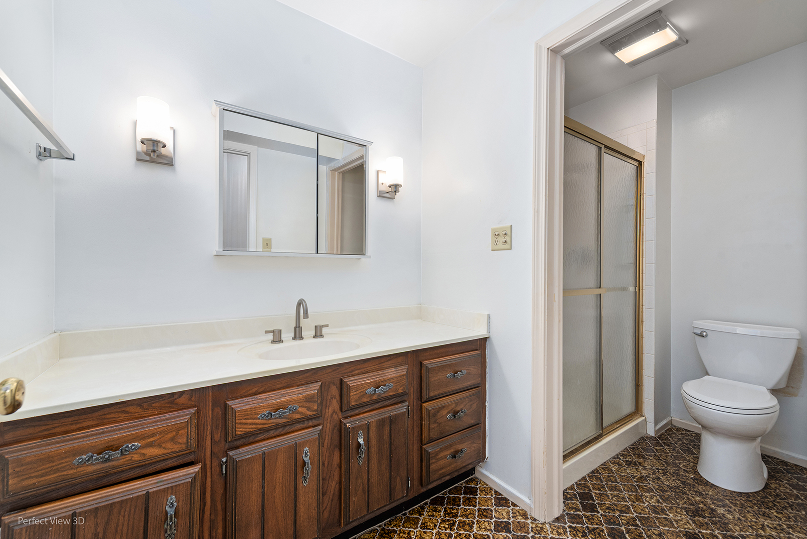 150 Lake Boulevard, Unit 125 Buffalo Grove, IL 60089 - Photo 20 of 30 a bathroom with a toilet sink and mirror