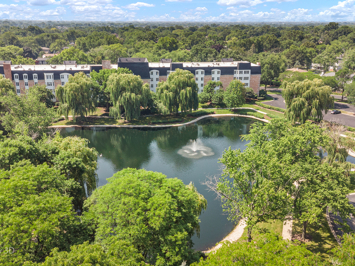 150 Lake Boulevard, Unit 125 Buffalo Grove, IL 60089 - Photo 2 of 30 an aerial view of residential houses with outdoor space and lake view